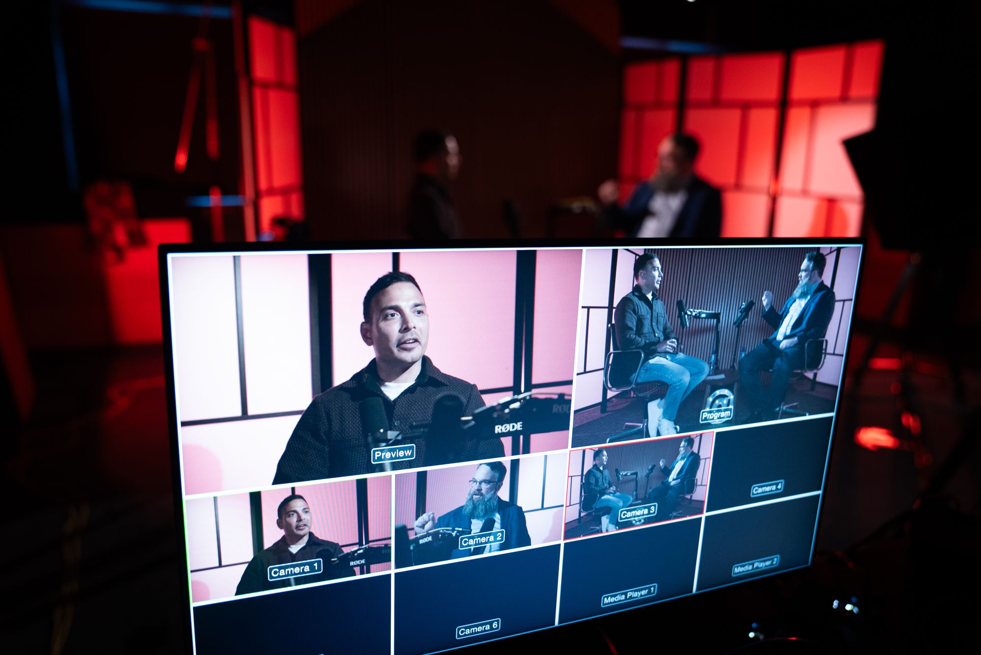 Podcast recording in the studio, seen on the camera switcher monitor